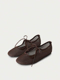 Nöista A Pair Of Fashionable Brown Flat Mesh Ballet Shoes, Featuring Breathable Mesh Design And Delicate Lace-Up Details, Creating A Modern Feminine Look. - Image 1